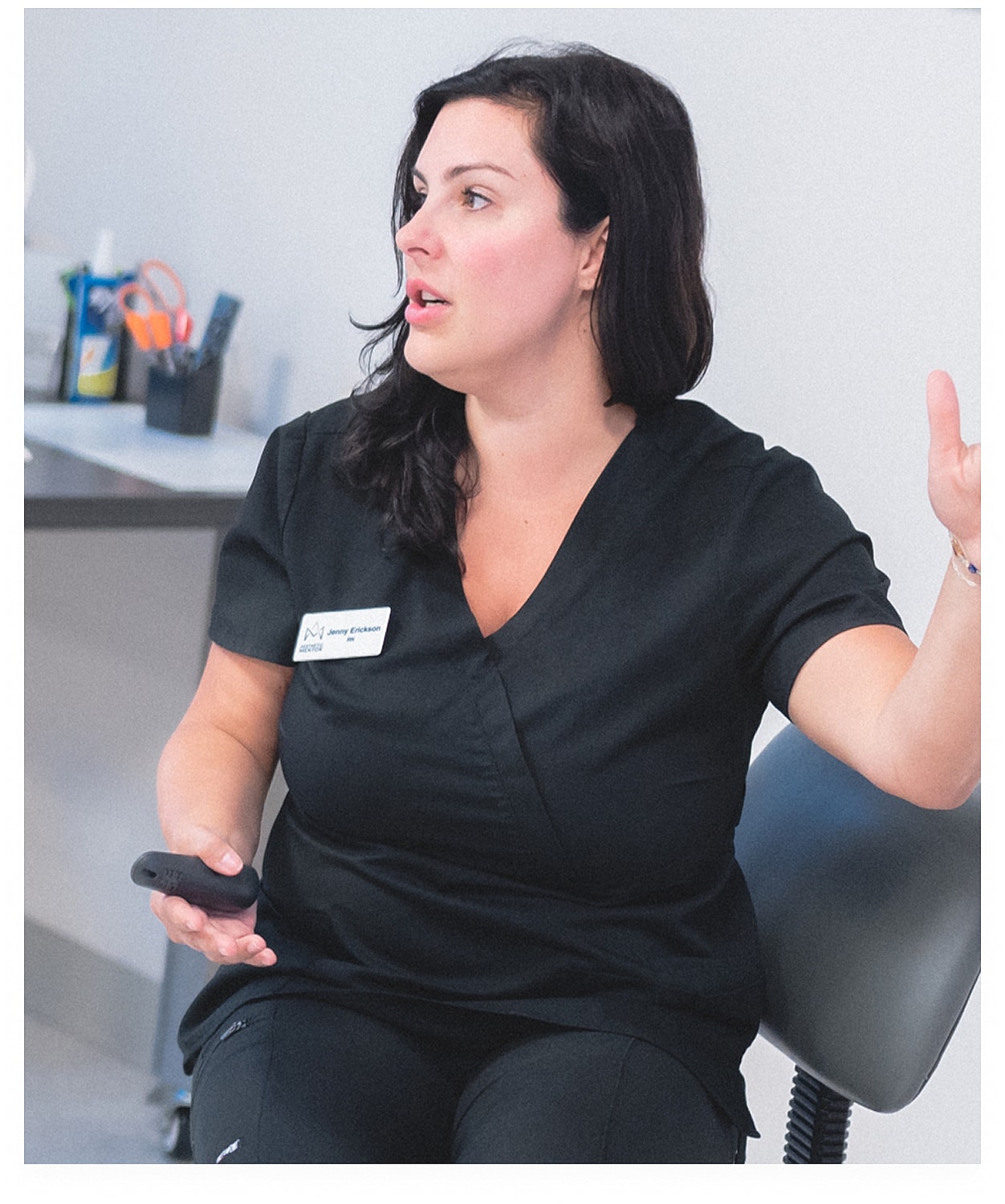 Female healthcare professional engaged in discussion.