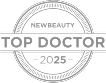 NewBeauty Top Doctor 2025 award seal