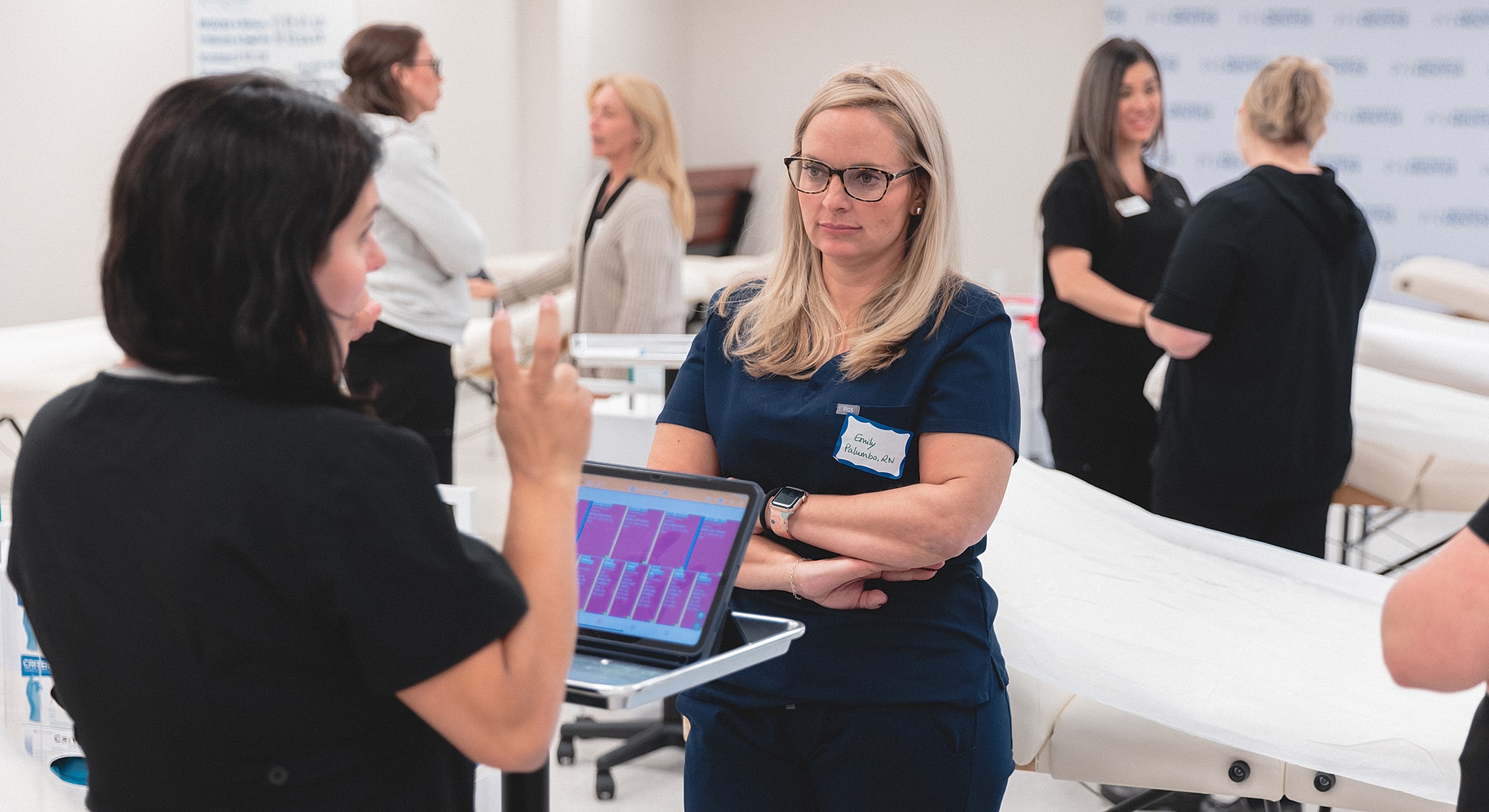 Medical professionals engaging in a training session.